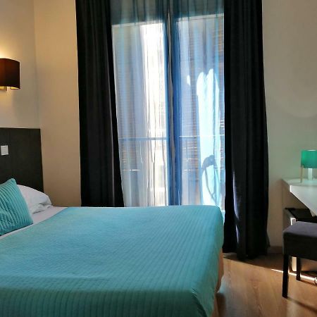 Brit Hotel Colbert Juan-les-Pins Bagian luar foto