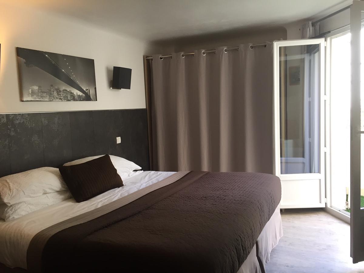 Brit Hotel Colbert Juan-les-Pins Bagian luar foto